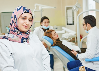 A woman sitting in a doctors office.