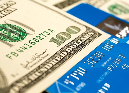 Credit card and a 100 dollars